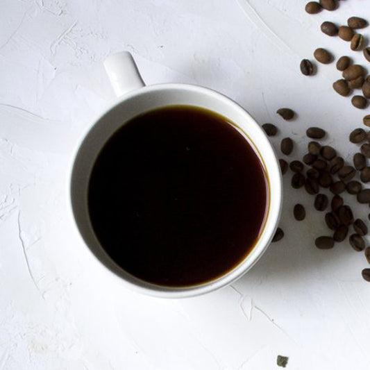 Cup of organic medium dark roast Peruvian coffee.