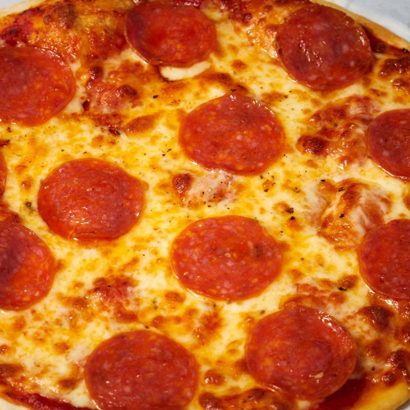 Classic flatbread pizza with fresh cheese and pepperoni.