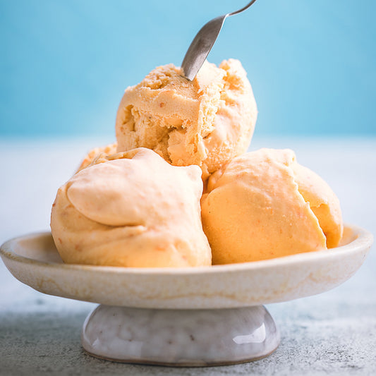 Scoops of vanilla bean ice cream, made from scratch.