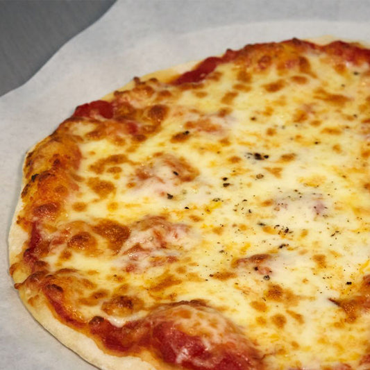 Classic flatbread pizza with fresh cheese.