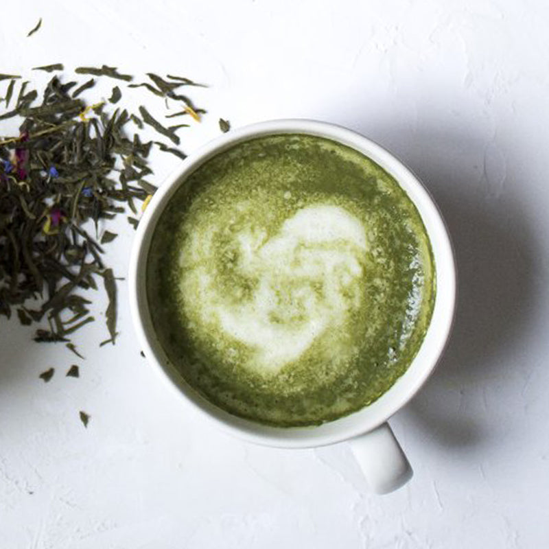 Freshly brewed matcha green tea with hot steamed milk.